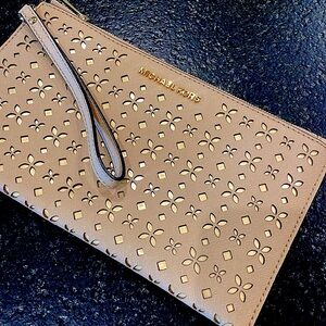 Michael Kors nude pink wristlet envelope purse- rose gold cutouts and accents